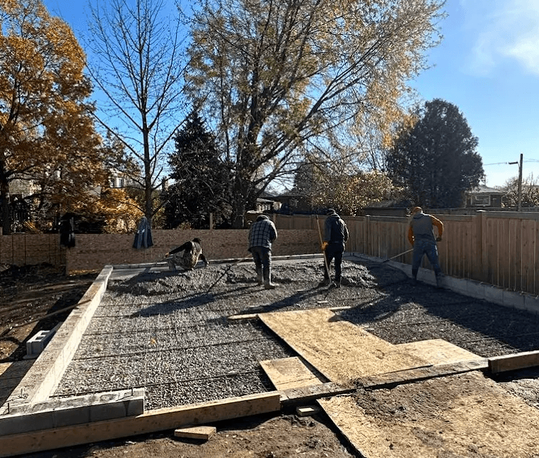 Nashville Concrete Solutions crew pouring a large backyard concrete slab